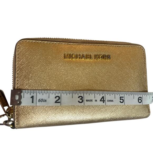 Michael Kors Jet Set Travel Leather Continental Wristlet in a gold metallic - Picture 6 of 7